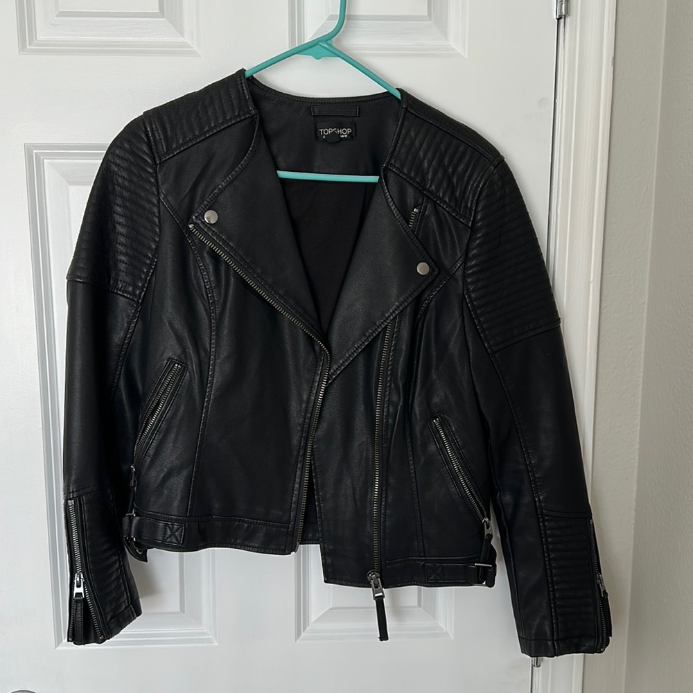 Black leather moto jacket from Topship with silver hardware